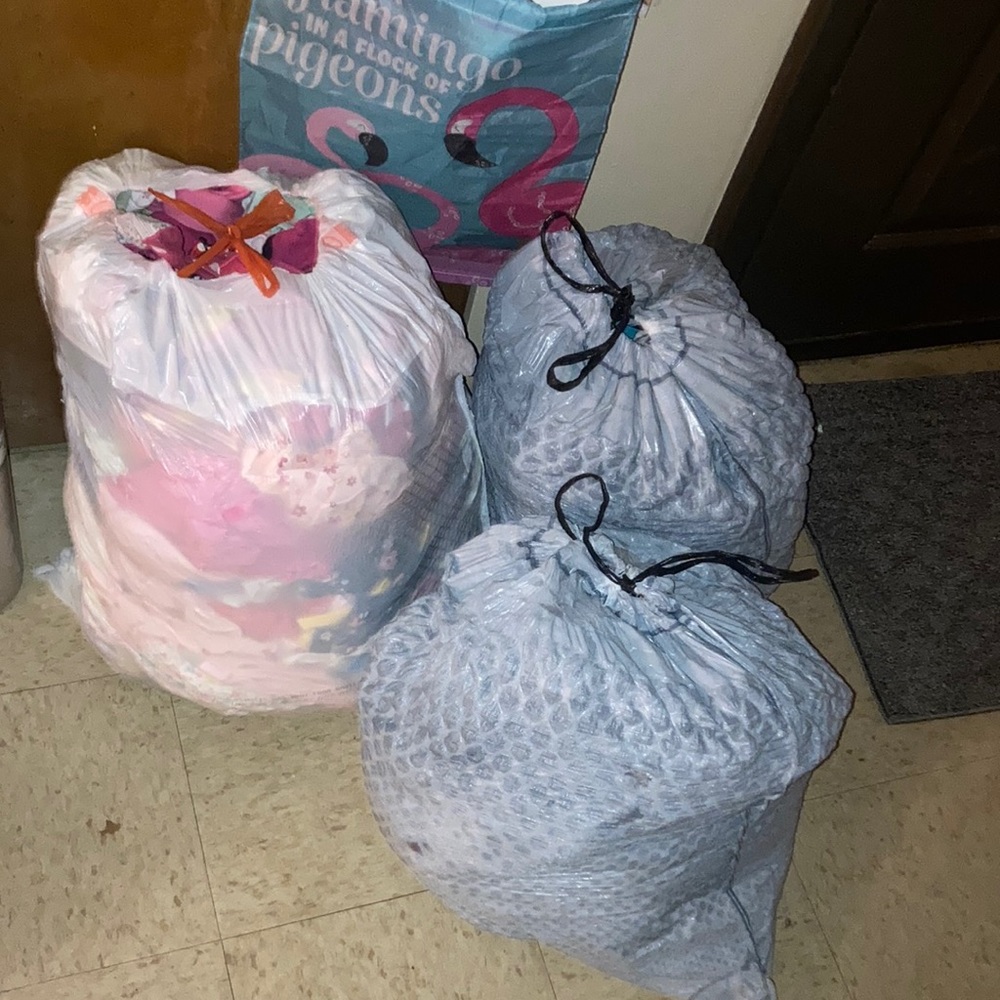 baby clothes for girls from newborn to 12 months each trash bag is $20